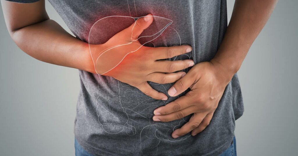 A Person Holding His Stomach