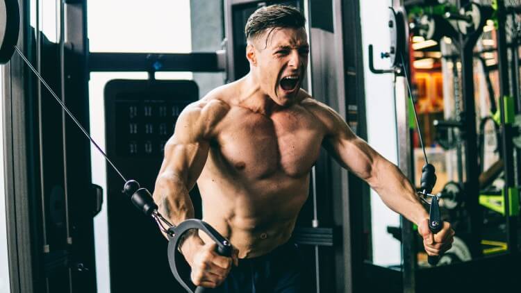Muscular Man In Gym Pumping Chest With Struggling Expression 1