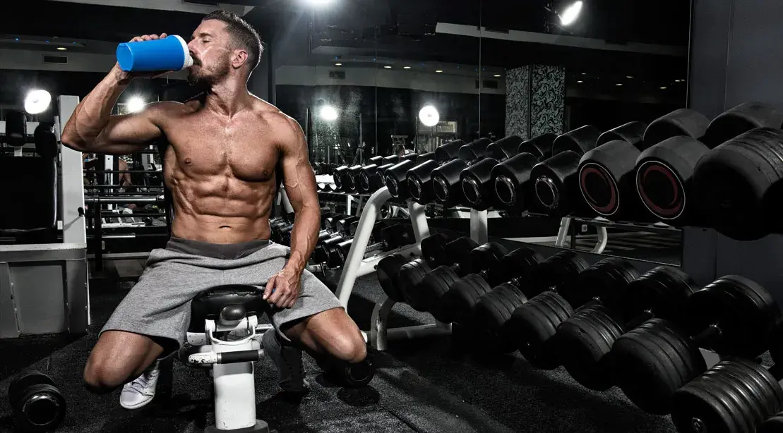 1109 Muscular Man Drinking Protein Shake 1