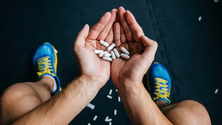 Man Holding Pills
